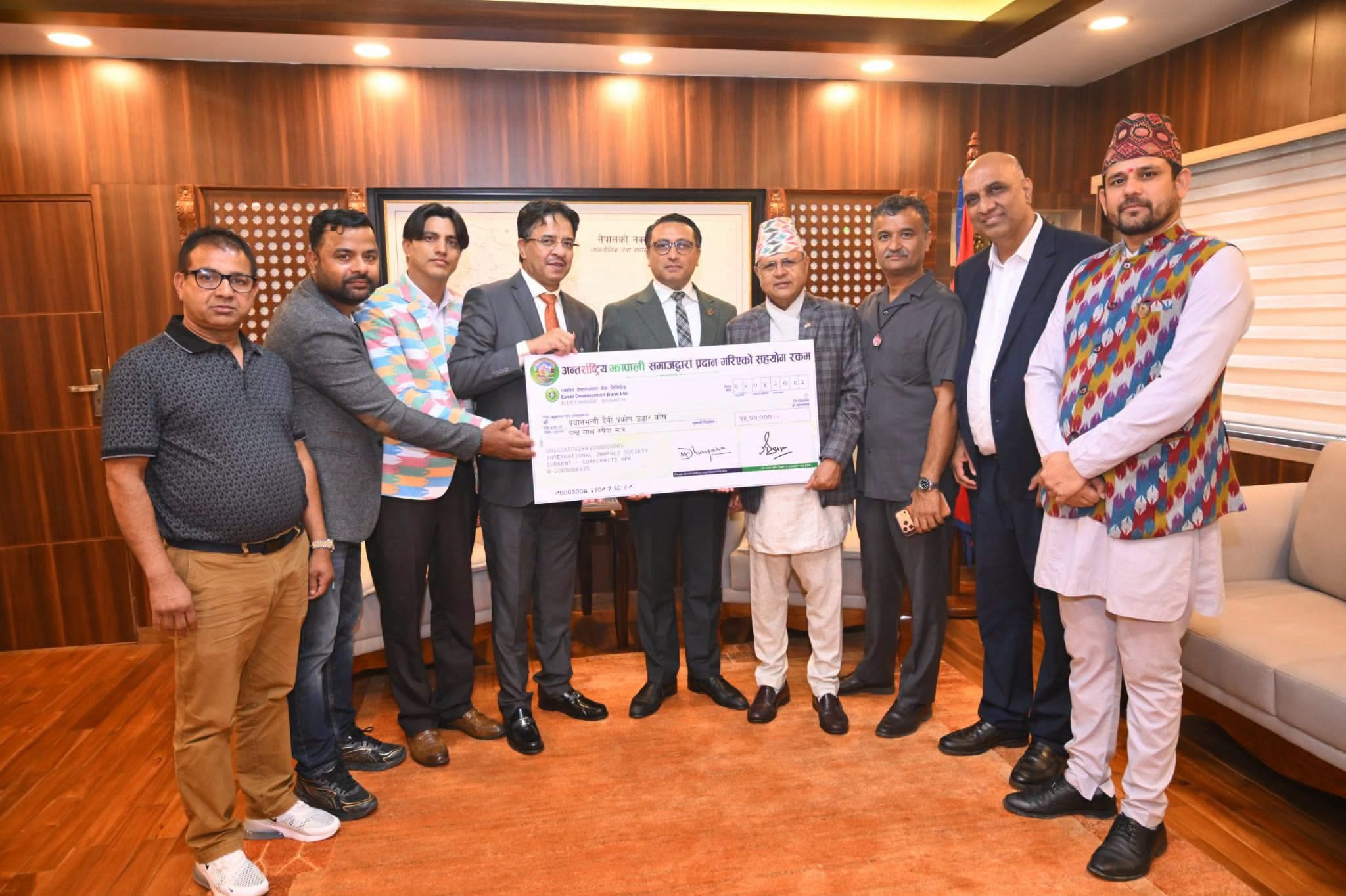 दैवी प्रकोप राहतका लागि अन्तर्राष्ट्रिय झापाली समाजद्वारा १५ लाख सहयोग